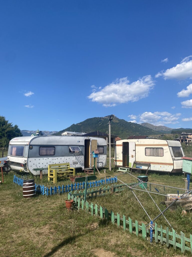 RV’s parked beside Plav Lake in Montenegro