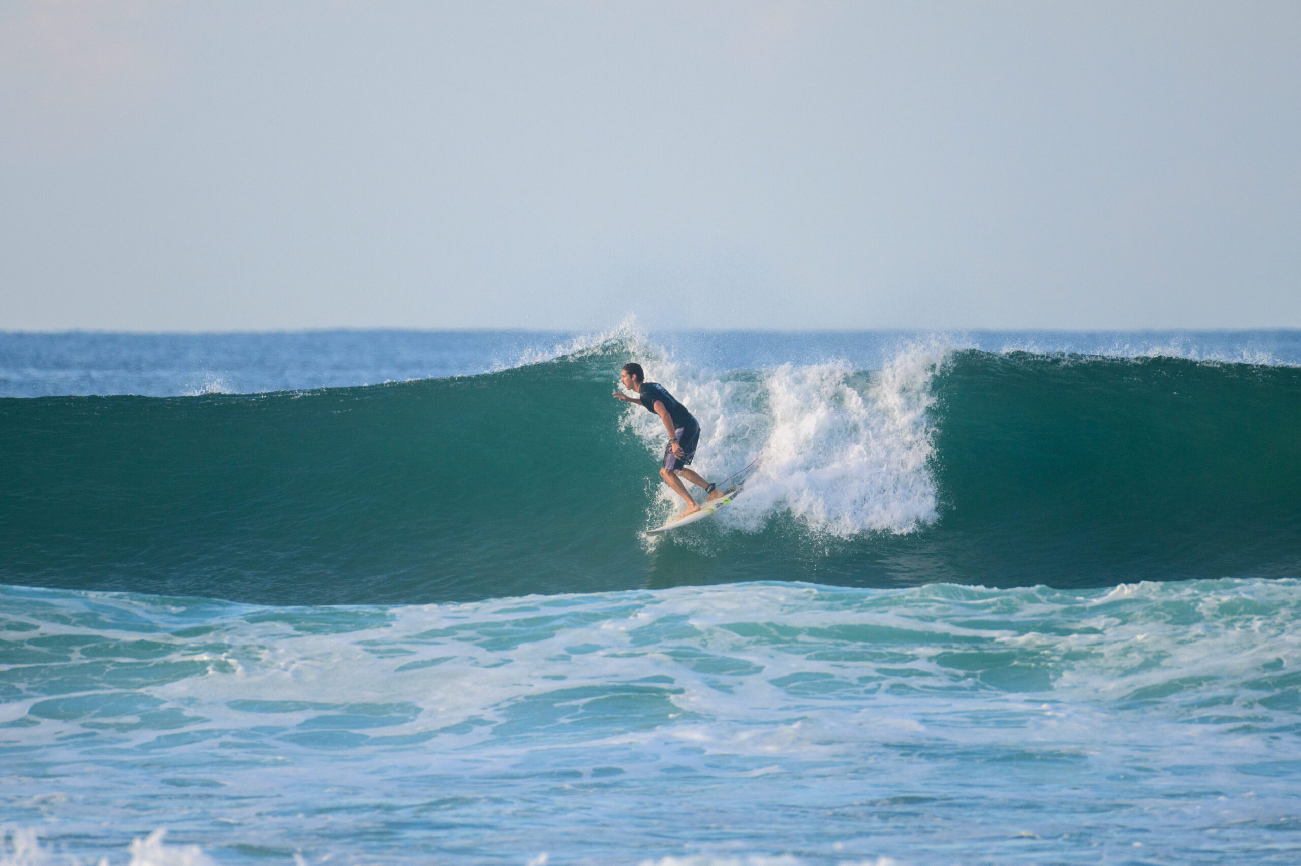 Riley surfing at Animals